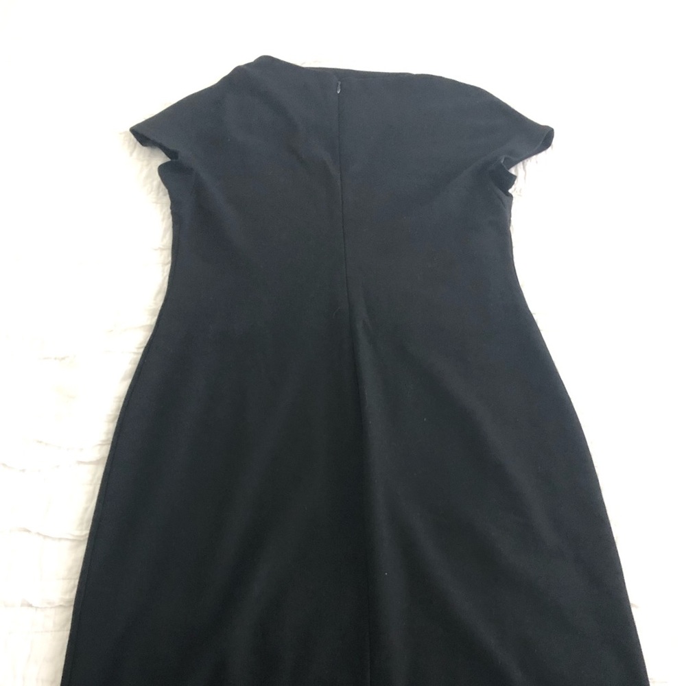 Black dress with asymmetrical high boat neck